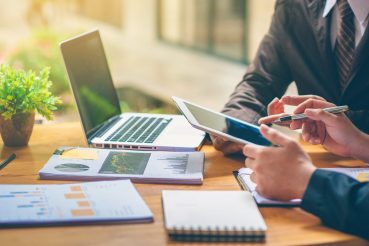 Business people are analyzing and planning business. Business Strategy Consulting Business people are analyzing and planning business. Business Strategy Consulting