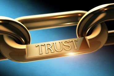 Trust chain as business concept Trust word as symbol in chrome chain